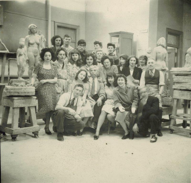 Sculpture class of Ossip Zadkine at the Art Students League of NYC, 1943-44 (Zadkine in middle, Berta Rosenbaum Golahny third from left in middle row)